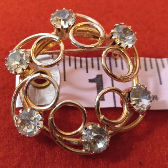 Vintage Gold tone metal, Circular Swirl Rhinestone Brooch Cottagecore - Picture 4 of 5